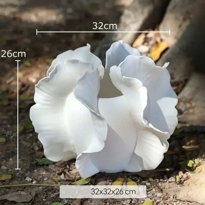 White and gray ruffled ceramic vase with artificial flowers for living room decor featuring decorbites colorful wings design