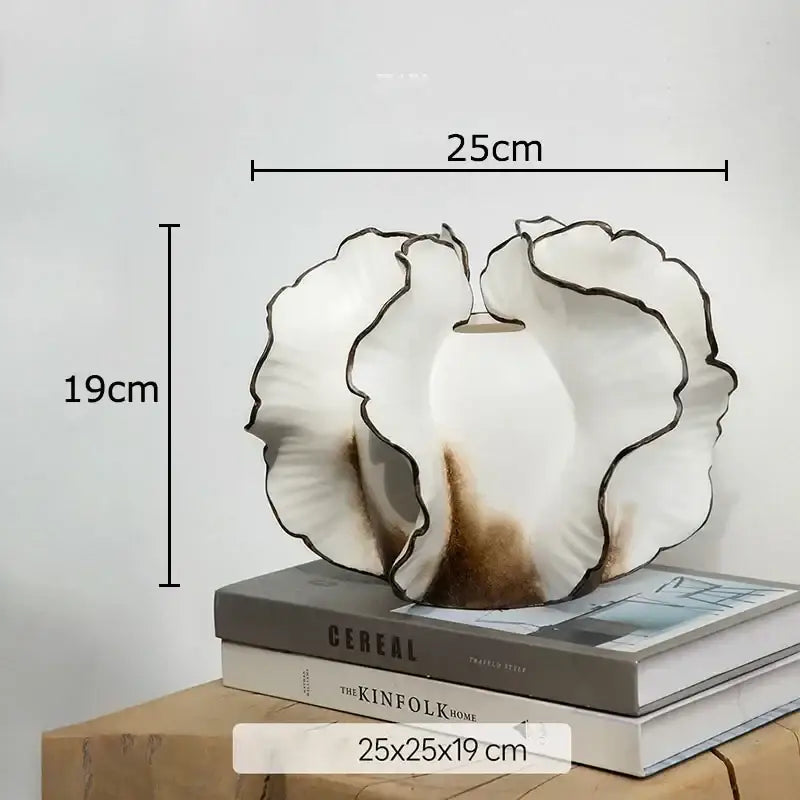 White and gray ruffled ceramic vase with black rimmed edges and artificial flowers for decorbites colorful wings decor