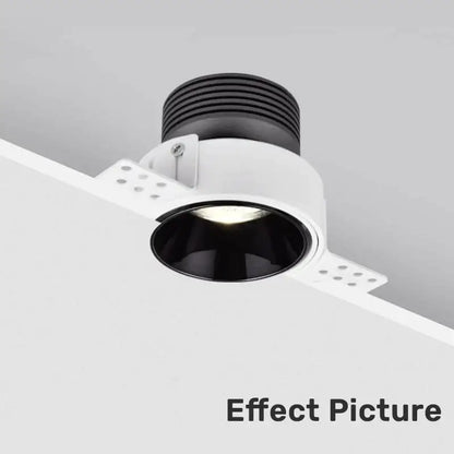 White honeycomb double head square led downlight with a white and black recessed fixture and ribbed black top ring