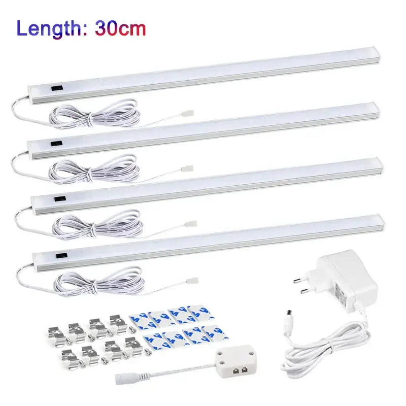 Four white led motion sensor cabinet lights 30cm with sleek aluminum casing and integrated power cords for under counter use