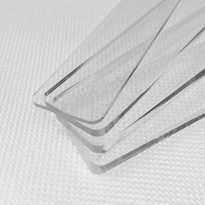 White plastic biscuit cake rolling tool featuring clear acrylic sheets with smooth rounded edges for biscuit cake rolling