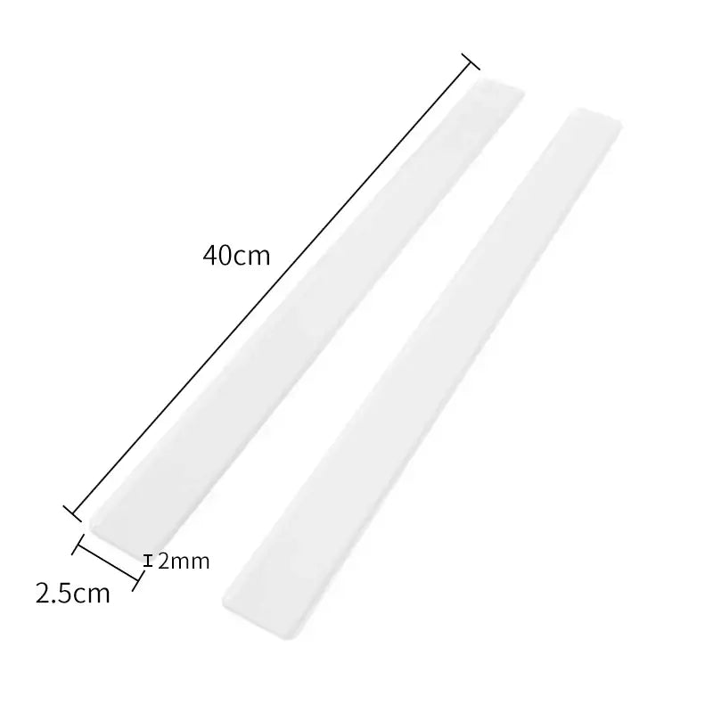 Two translucent white plastic biscuit cake rolling tool strips measuring 40cm by 2.5cm for precise cake rolling