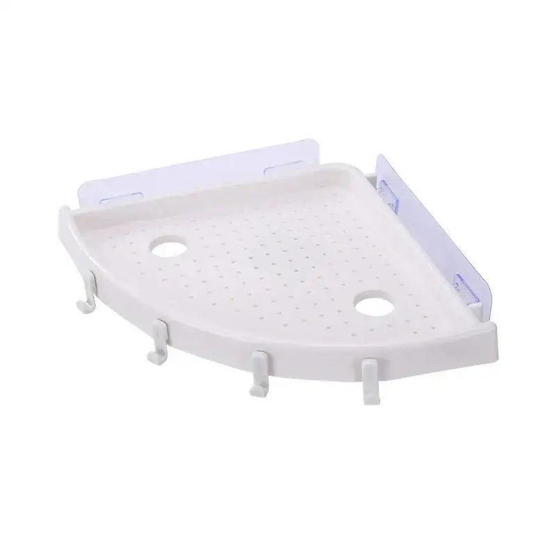 White plastic corner bathroom shelf organizer caddy with perforated surface and integrated hooks bathroom shelf organizer