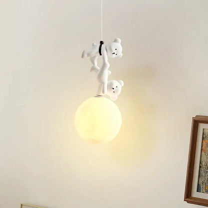 White plush bear pendant lamp featuring two bears climbing a glowing moon for a nursery room or bear nursery room