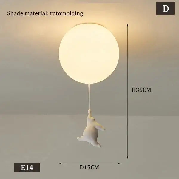 White polar bear ceramic pendant light with white rotomolded spherical shade and dangling bunny figurine cord pendant