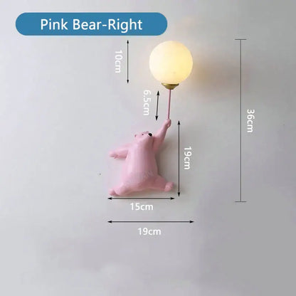 Pink bear night light with warm-toned glass globe and slender stem suitable for kids bedroom moon lamp decor