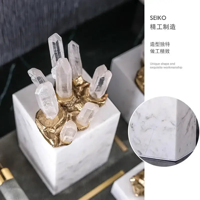 White quartz crystal stone marble ornament set with gold accents holding clear quartz crystals for living room decor
