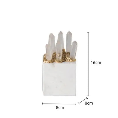 White quartz crystal stone marble ornament with golden leaf accents holding translucent quartz crystals for living room decor