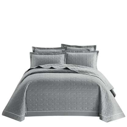 Gray quilted cotton coverlet bedspread set with subtle woven pattern and white piping for decorbites bedroom decor