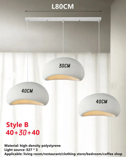 Modern minimalist white wabi sabi triple dome pendant lamp with matte polystyrene shades and warm interior glow for dining room decorbites handmade wabi