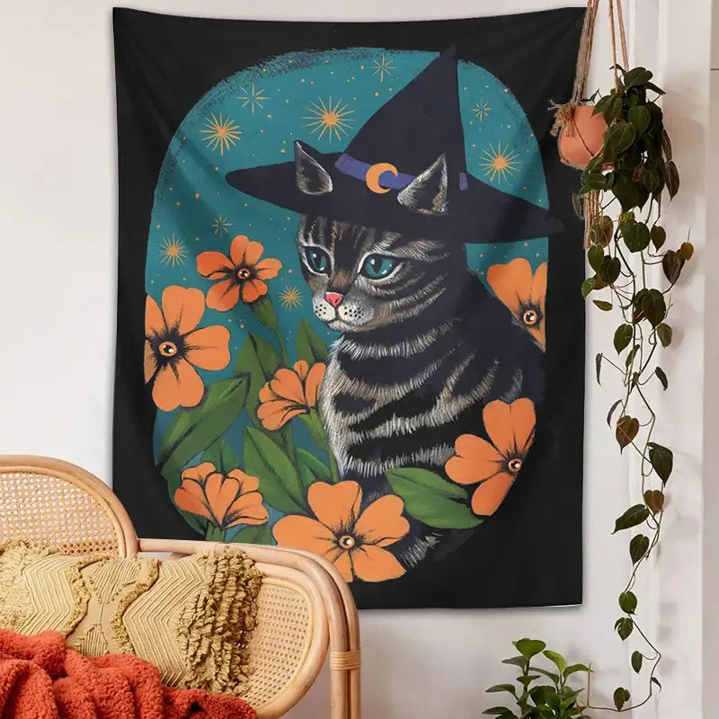 Black tapestry wall hanging featuring a gray tabby cat with a witch hat and orange flowers for decorbites cat tapestry