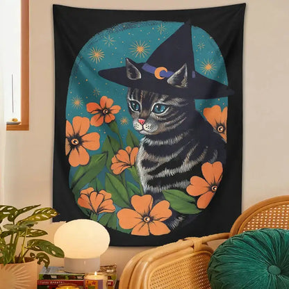 Black tapestry wall hanging featuring a gray tabby cat wearing a witch hat with orange flowers for decorbites cat tapestry wall decor