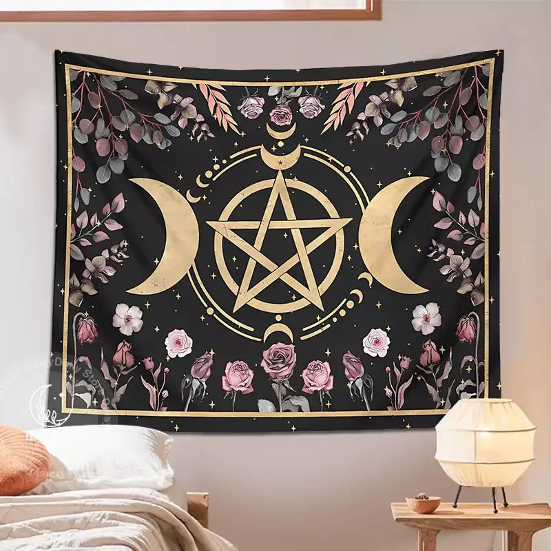 Witchy black and gold botanical floral moon tapestry featuring a gold pentagram, crescent moons, pink roses, and eucalyptus decorbites