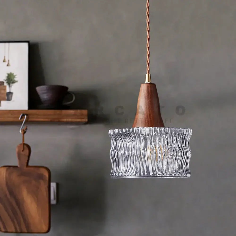 Wood and textured glass pendant light with wavy design and wooden base compatible with led bulb for dining room