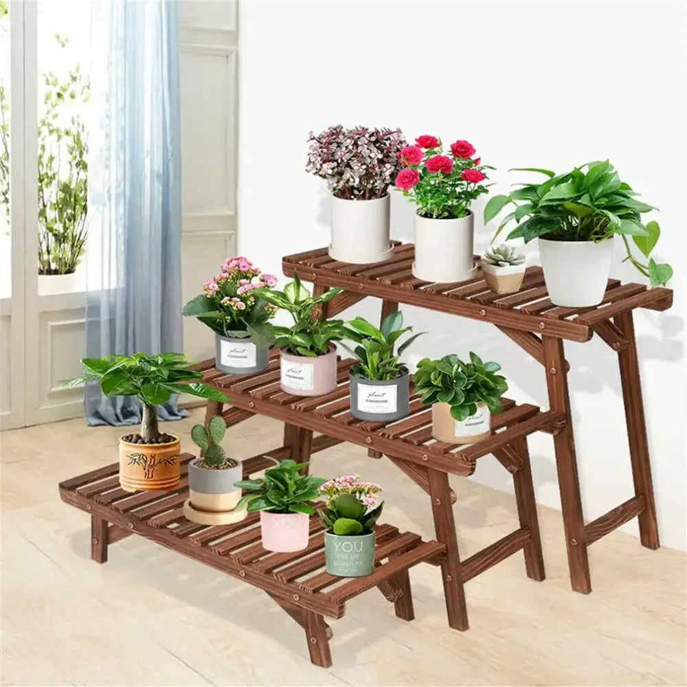 Brown wooden two-tier plant stand with slatted shelves and angled legs as a wood plant ladder shelf by DecorBites