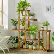 DecorBites™ 6-tier wood plant stand shelf with slatted shelves holding ceramic potted plants for indoor outdoor use