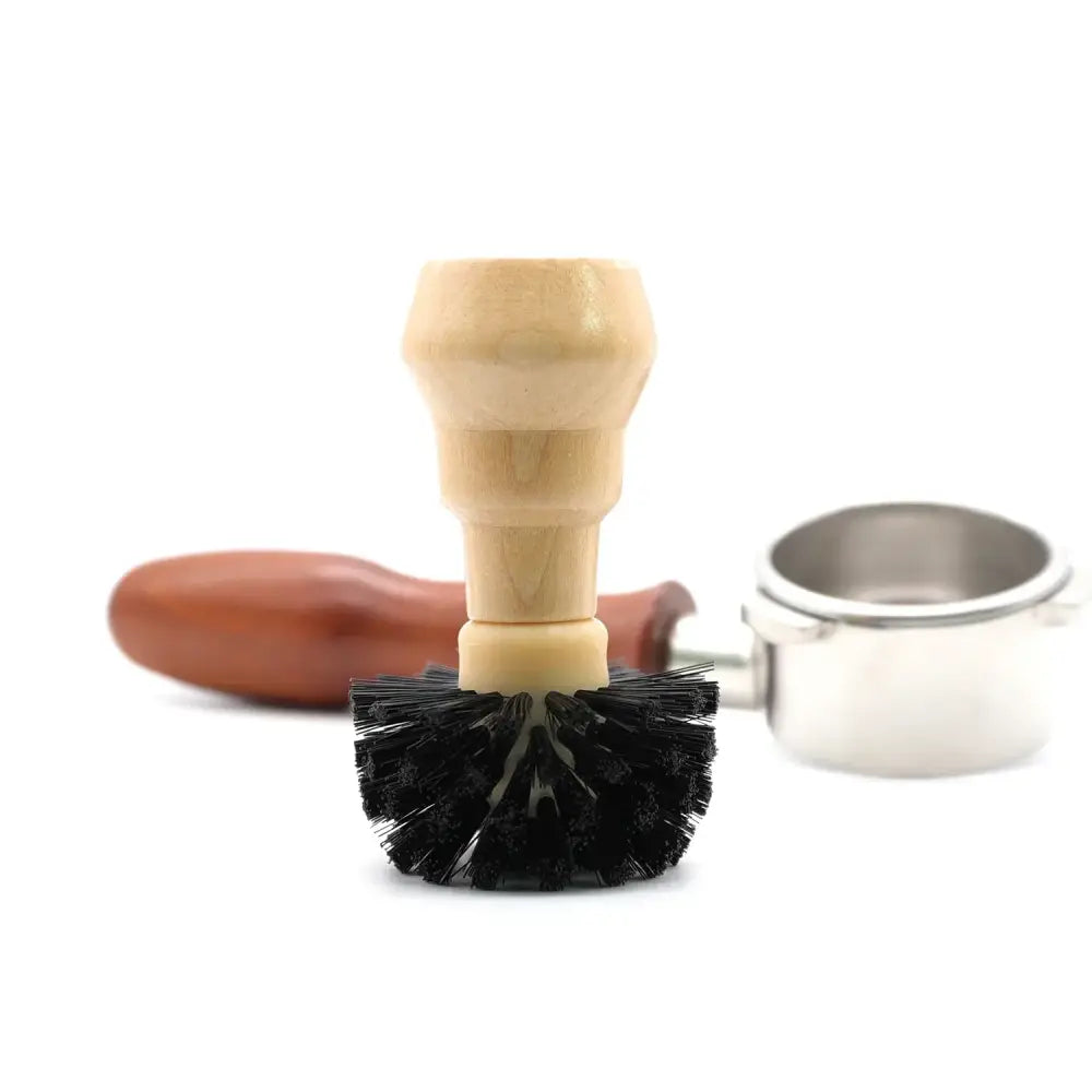 Wooden barista cleaning brush set with light-colored wooden handle and black bristles for espresso portafilter cleaning