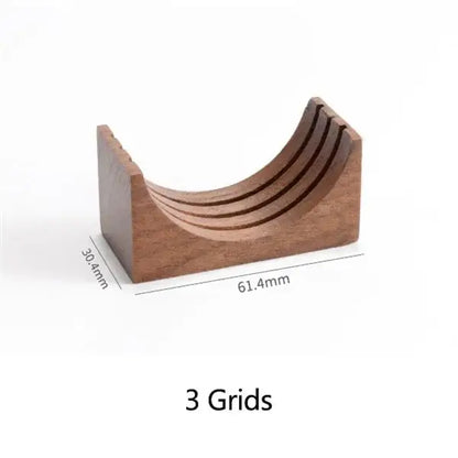 Wooden espresso filter screen holder with gray coasters featuring a curved u-shaped design and three grooves for filter screens