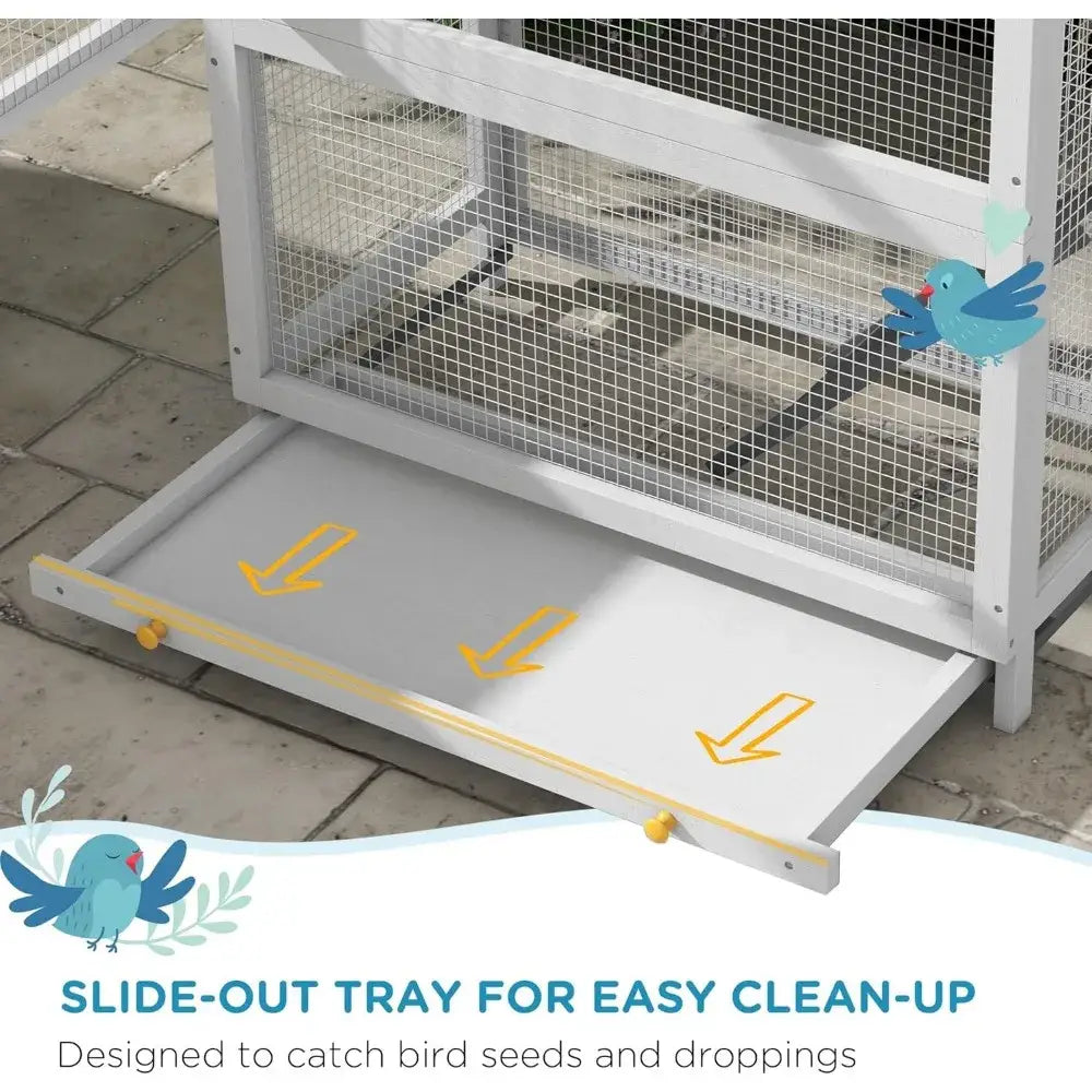 White slide-out wooden tray with yellow handles designed for easy clean-up in decorbites outdoor bird aviary