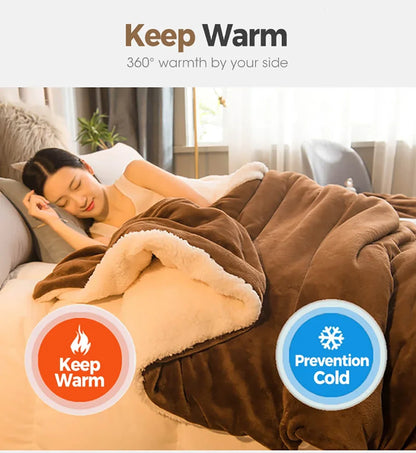 A plush brown and cream wool throw blanket with soft fleece texture designed for warmth on a double bed or camping use