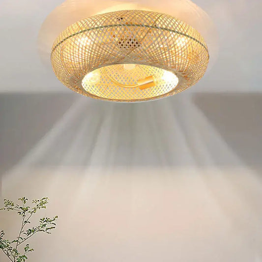 A warm circular woven bamboo ceiling fan with retractable blades and golden accents for bedroom decorbites bamboo ceiling