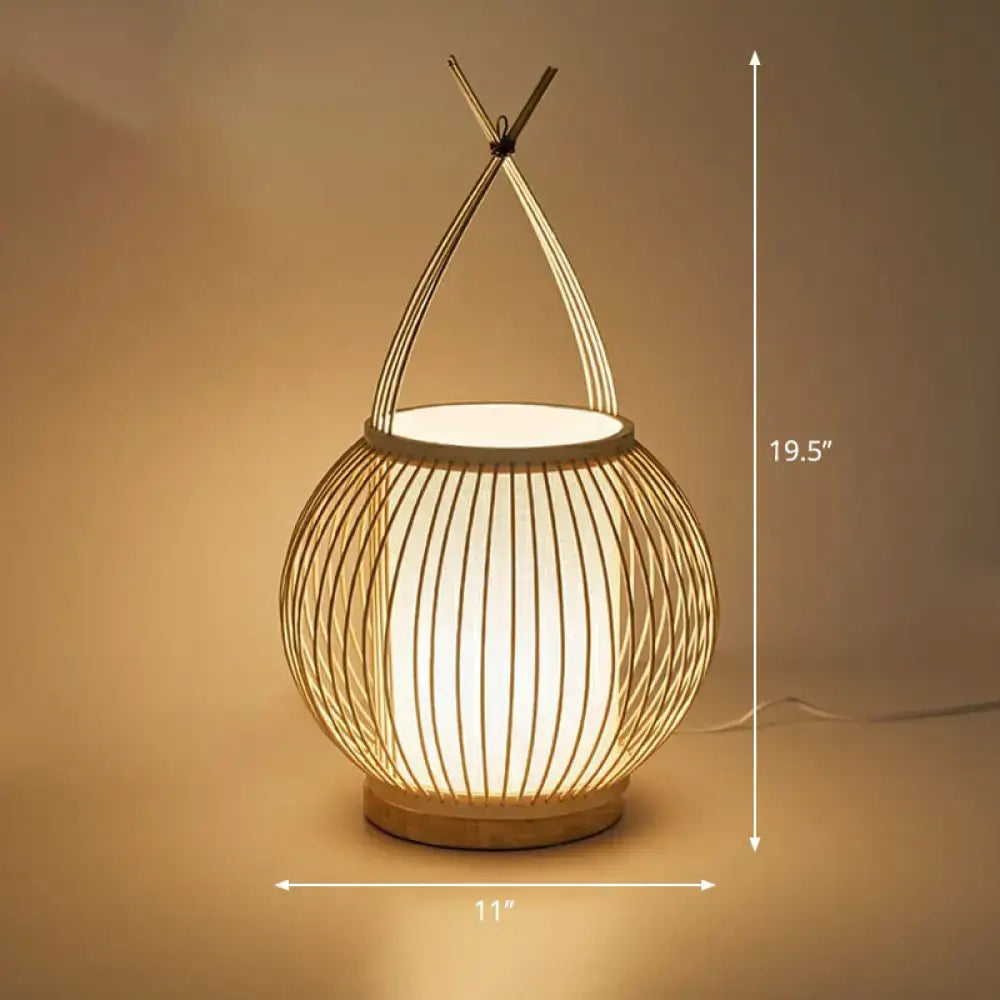 Warm-toned bamboo single restaurant nightstand lamp with woven cylindrical body and handle 220v-240v 110v-120v decorbites