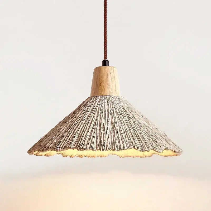Woven beige pendant light with wood accents featuring a textured grayish-brown woven shade decorbites designer pendant