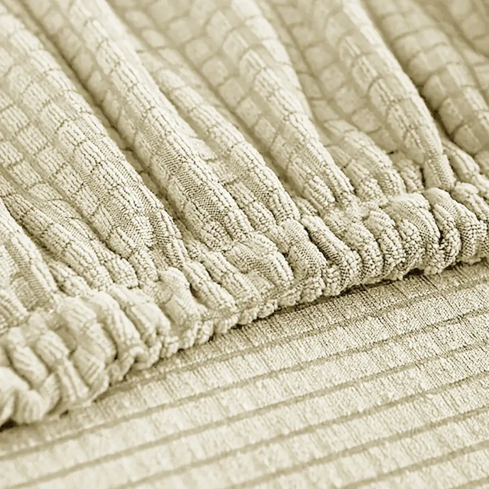 Beige corduroy fabric with ribbed texture and elasticized hem for woven brown and cream modular sofa cover outdoor protection