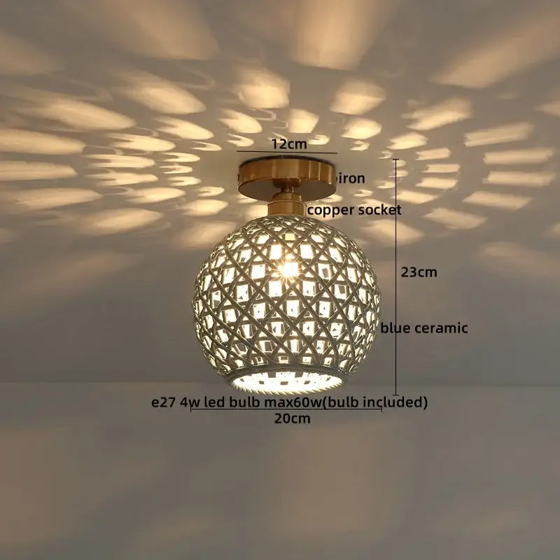 Woven ceramic led ceiling lamp in blue with copper socket and iron lattice casting geometric shadows by decorbites ceramic led