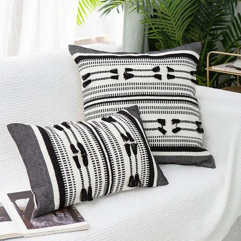 Black and white woven geometric tassels cushion cover with tassel accents for decorbites living room decor
