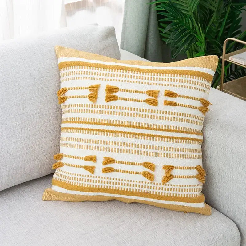 Square mustard-yellow and white woven cushion cover with decorbites geometric tassels for living room decor