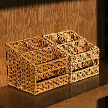 Two light brown woven wicker desktop tissue box pen holders with divided compartments on a wooden surface