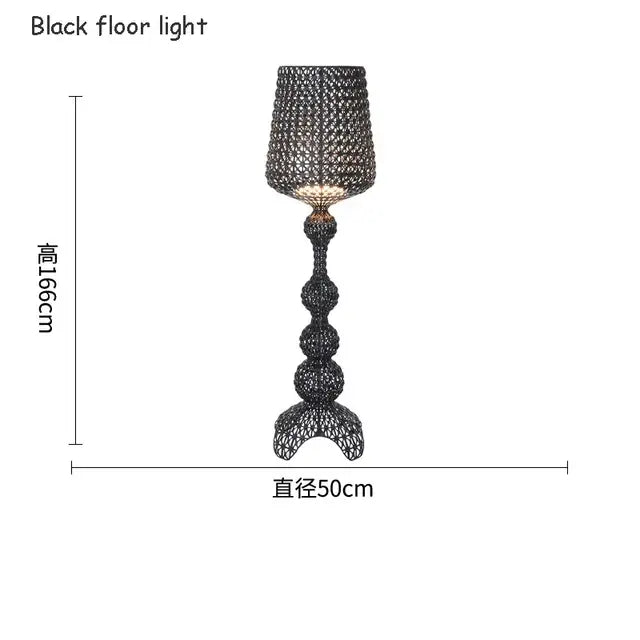 Black woven wire floor lamp with a tall sculptural base and intricate mesh shade for decorbites acrylic kabuki lighting