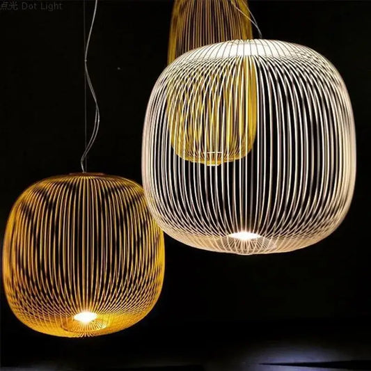 Warm-toned spherical pendant light with woven wireframe design and polished chrome finish for dining room use