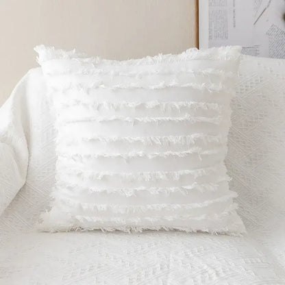 White pillow cover with layered frayed fabric detailing featuring decorbites daisy floral embroidery for living room decor