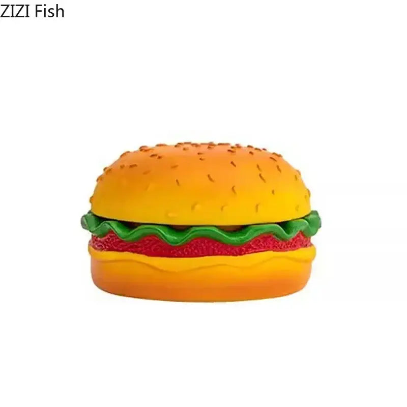 Yellow and green cartoon burger ashtray with vibrant orange and yellow plastic bun and red tomato for office decorbites cartoon burger decor