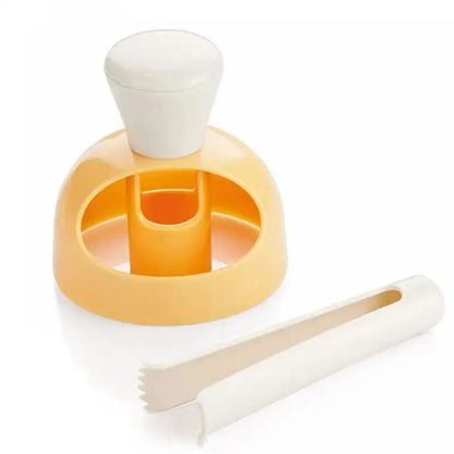 Yellow and white plastic apple corer and fruit cutter in a baking tools kit for kitchen use