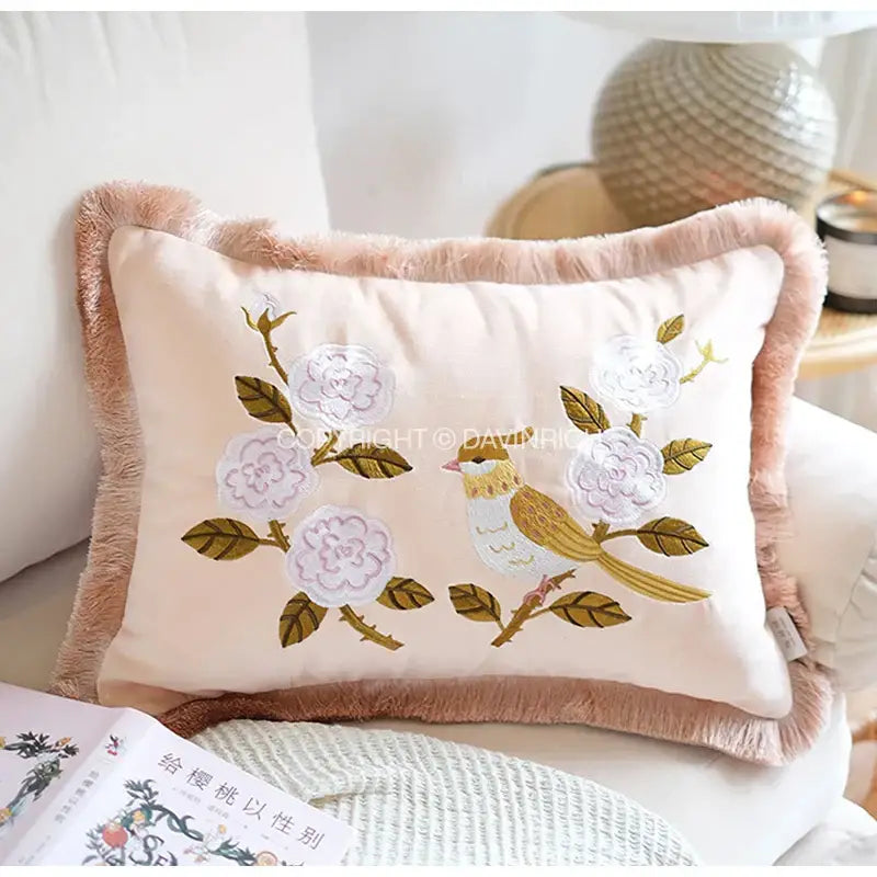 Yellow bamboo velvet throw pillow cover blush pink with embroidered white flowers green leaves and yellow bird fringe border