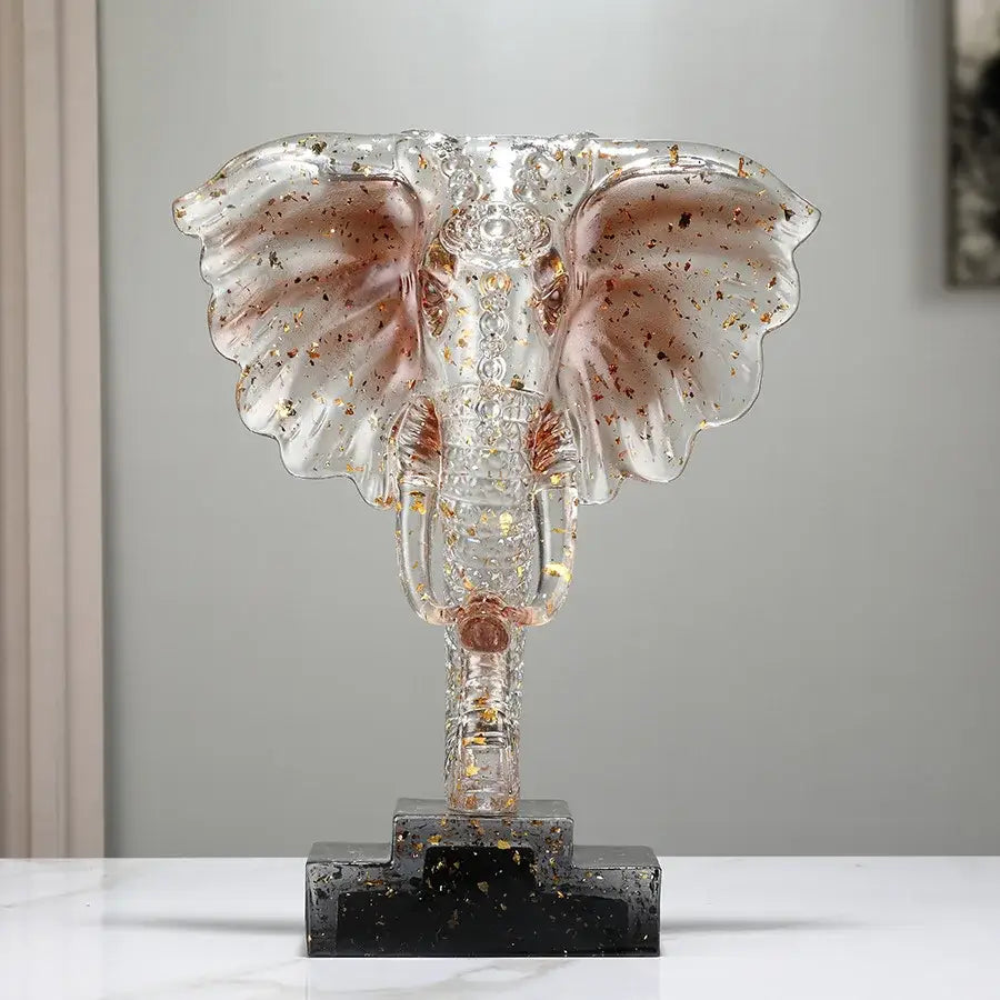 Transparent glass elephant sculpture with gold leaf and rose gold highlights on black base for home decor decorbites crystal elephant