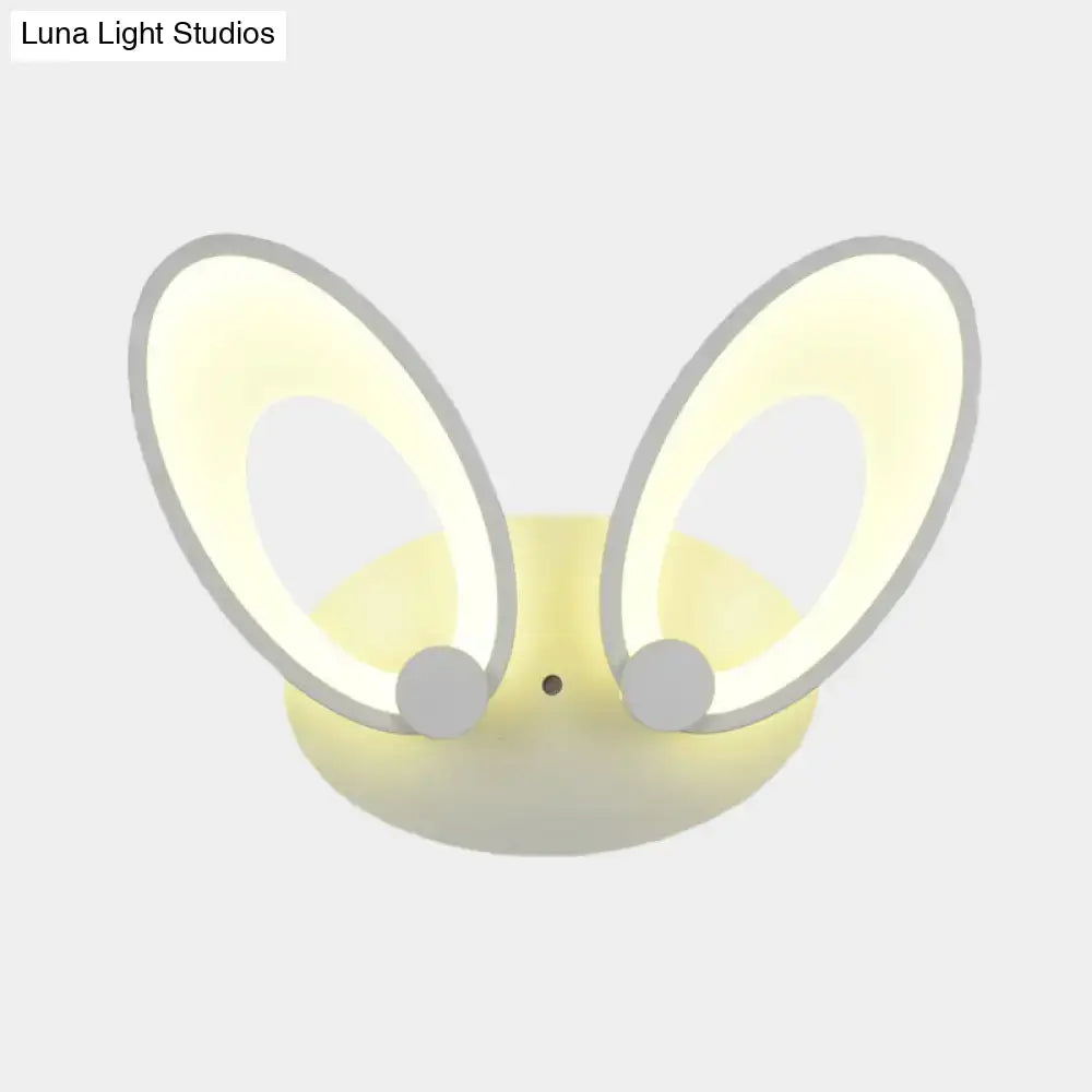 Soft yellow bunny-shaped LED ceiling light with glowing ears gray accents and white finish for bedroom decor