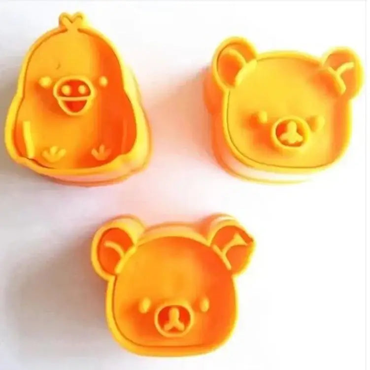Bright orange plastic cute bear sandwich mold and cookie cutter baking set shaped like a chick and two bears