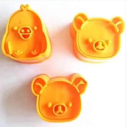 Bright orange plastic cute bear sandwich mold and cookie cutter baking set shaped like a chick and two bears