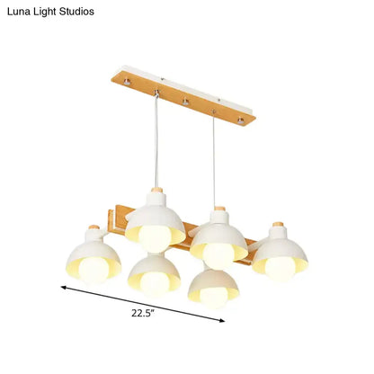 Modern farmhouse dome shade linear chandelier with five white ceramic lampshades on wood and matte white frame with chain cord length adjustments