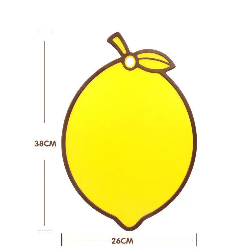 Bright yellow fruit shape silicone chopping board with brown outline and stem detail perfect for kitchen decorbites decor