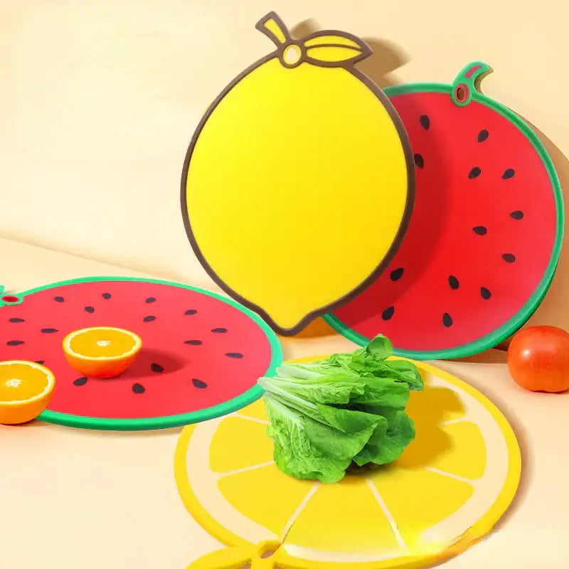 Yellow fruit shape silicone chopping board with bright yellow lemon design green rim and black seed decorbites fruit shape