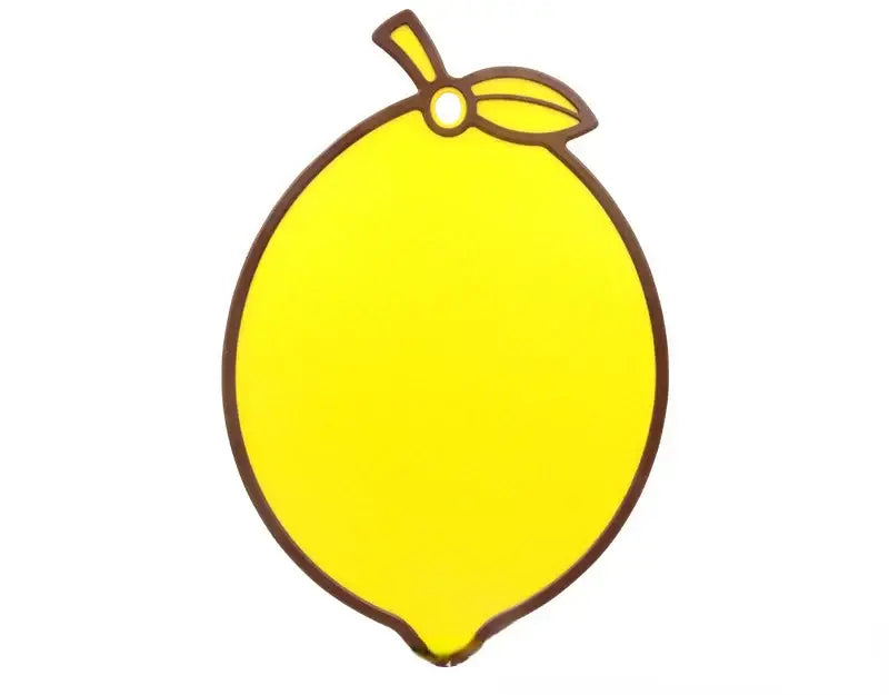 Bright yellow lemon-shaped silicone chopping board with brown outline and leaf detail for decorbites fruit shape decor