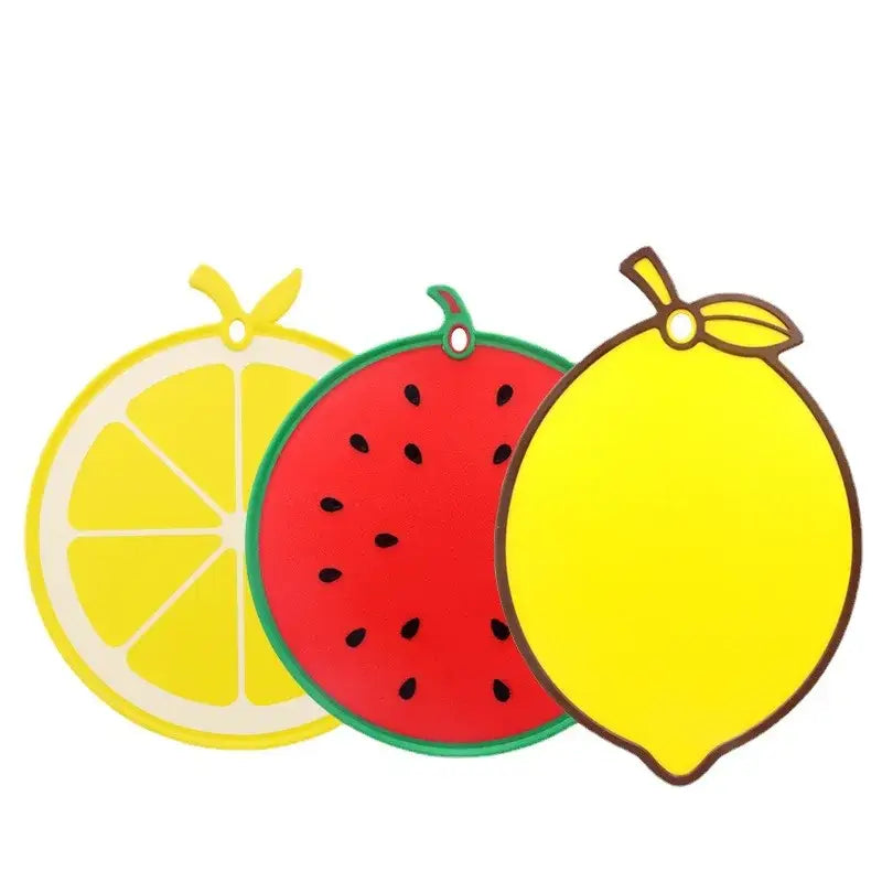 Set of three colorful yellow fruit shape silicone chopping boards featuring lemon slice, watermelon, and whole lemon decorbites fruit shape