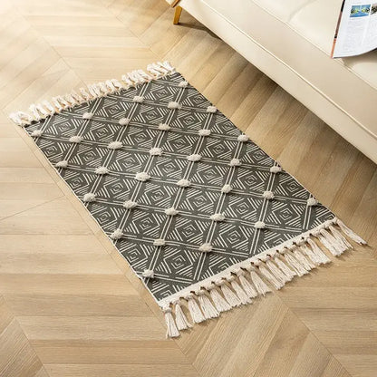A decorbites handmade nordic gray and cream geometric floor mat with nordic 3d tassel for living room decor
