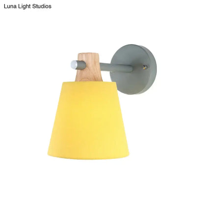 Yellow macaron fabric wall light with conical lampshade wood accent e26 e27 fixture mounted on gray metal arm