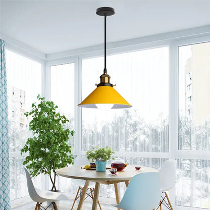 Yellow nordic pendant light with vibrant conical shade black rod and brass accents ideal for dining room decorbites colorful nordic